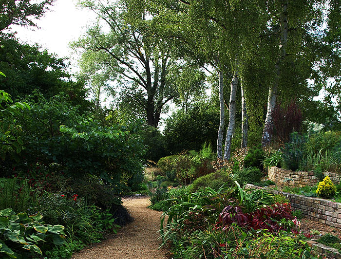 Path below the terraces at Fullers Mill Garden